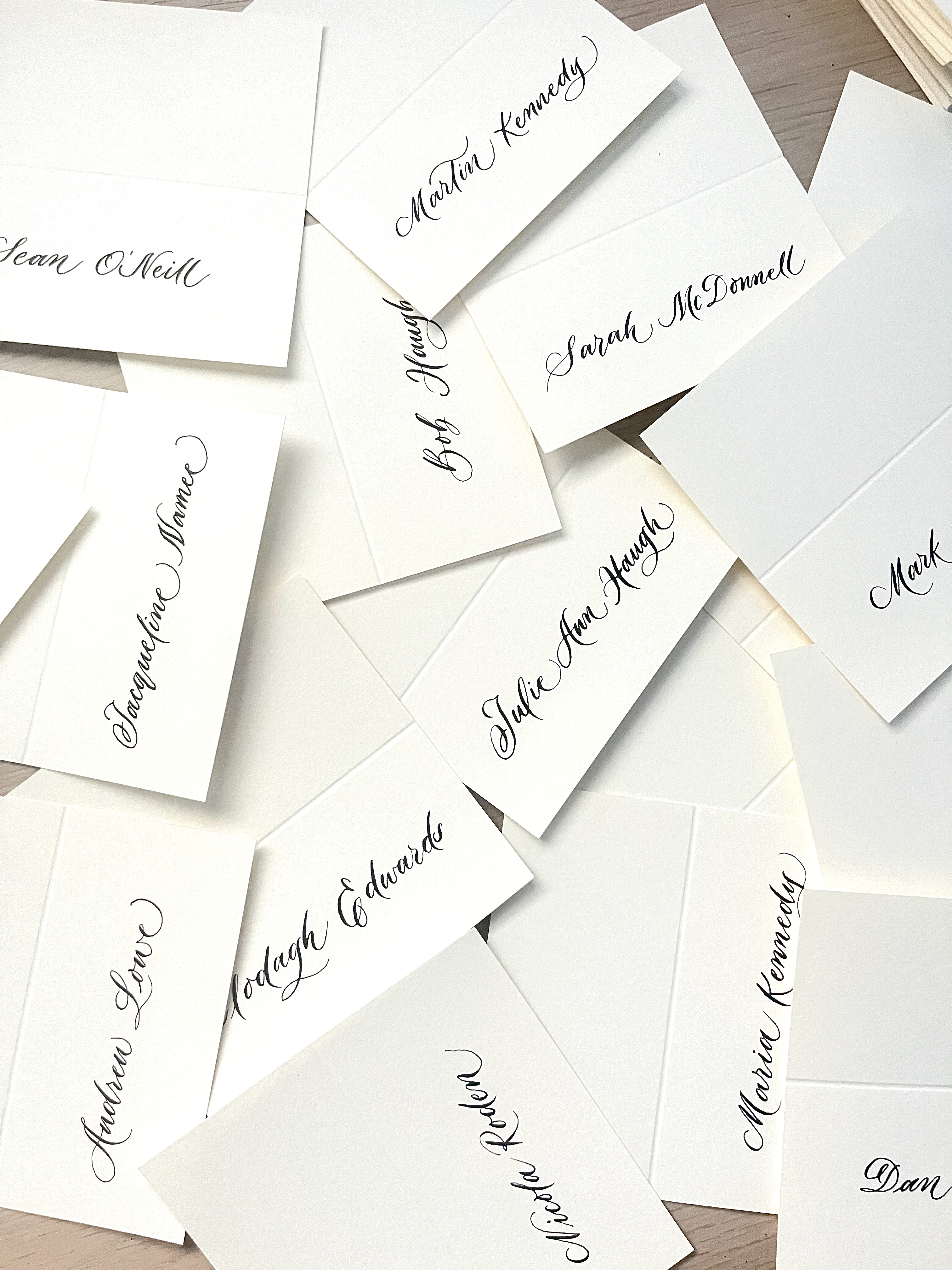 Hand-lettered wedding place cards